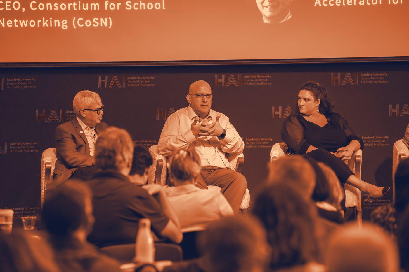 Kris Hagel on a panel at Stanford HAI