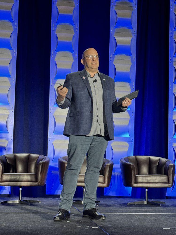Kris Hagel speaking on the main stage at CoSN